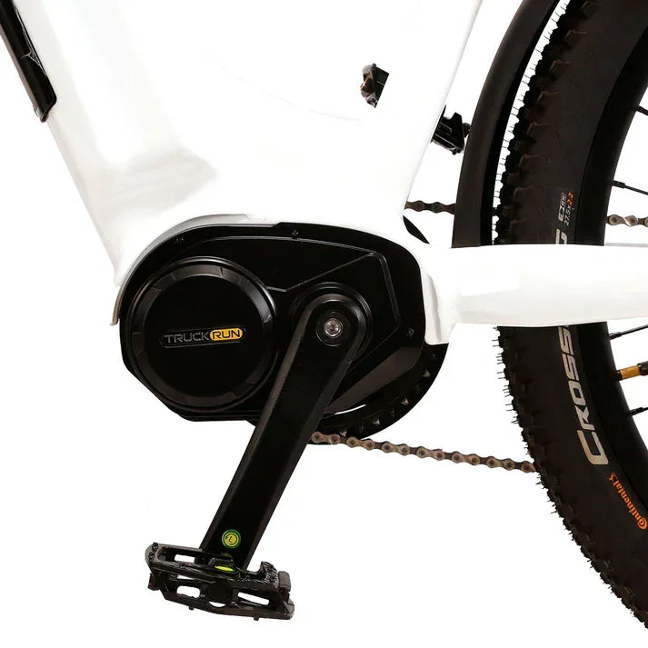 Close-up of a Cysum NOVA Step-Thru Electric Bike - UK with a black pedal and chain mechanism on a white background