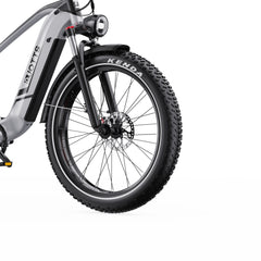 Close-up of a f26 Lite bicycle wheel with Kenda tire on a white background