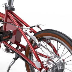 Close-up of a red OneSport OT02 Compact Folding Electric Bike frame and wheel on a white background
