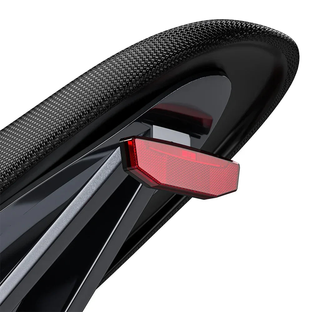 Close-up of a black bicycle seat with a red reflector on a white background