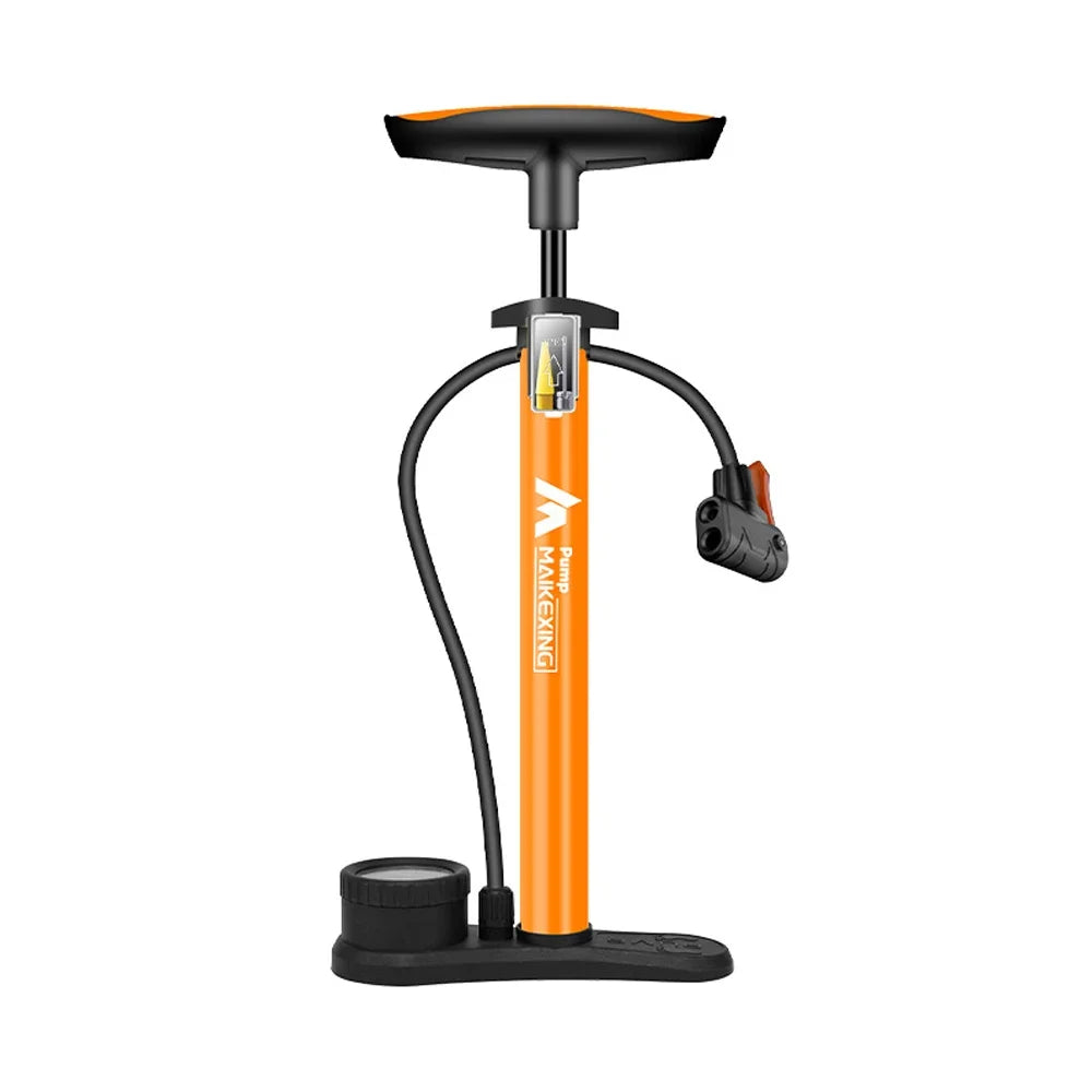 Orange and black floor pump on a white background