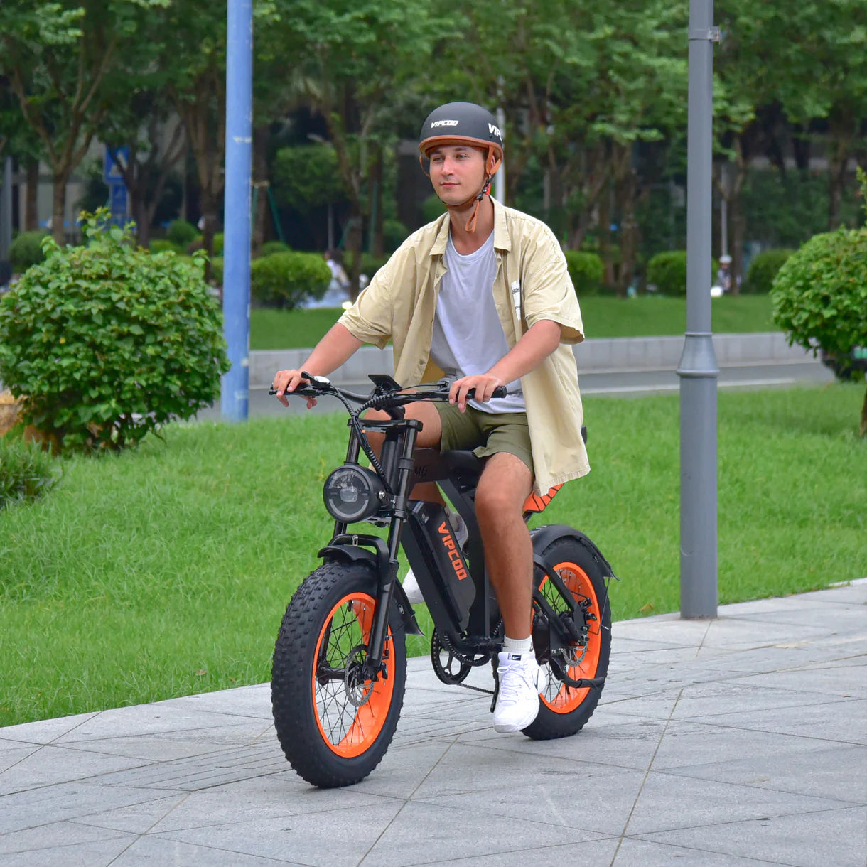 Person riding a VIPCOO VM6 Electric City Bike  in a park